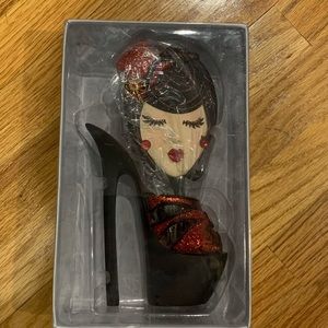 High heel hair brush holder